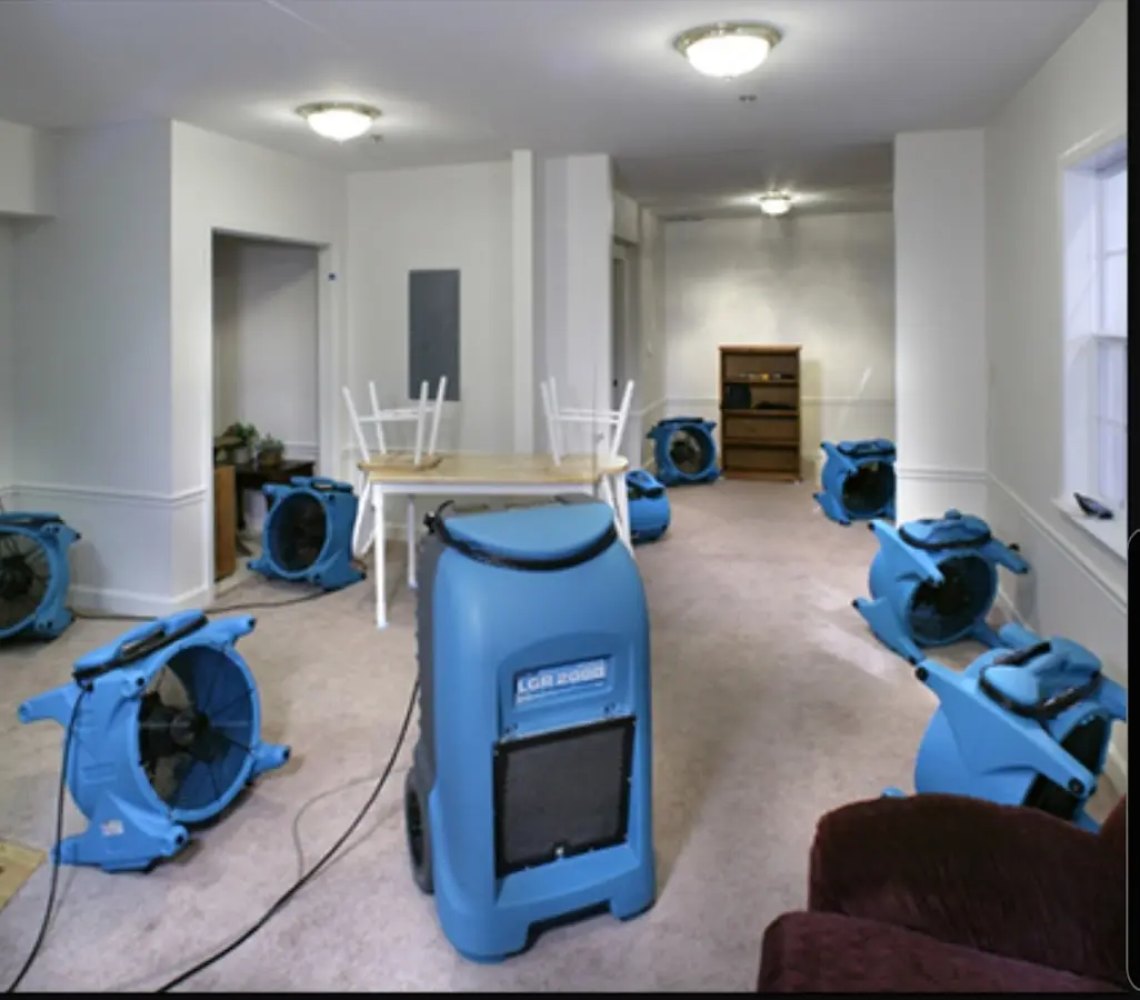 Air movers and dehumidifier setup for Water Damage Restoration in Merced
